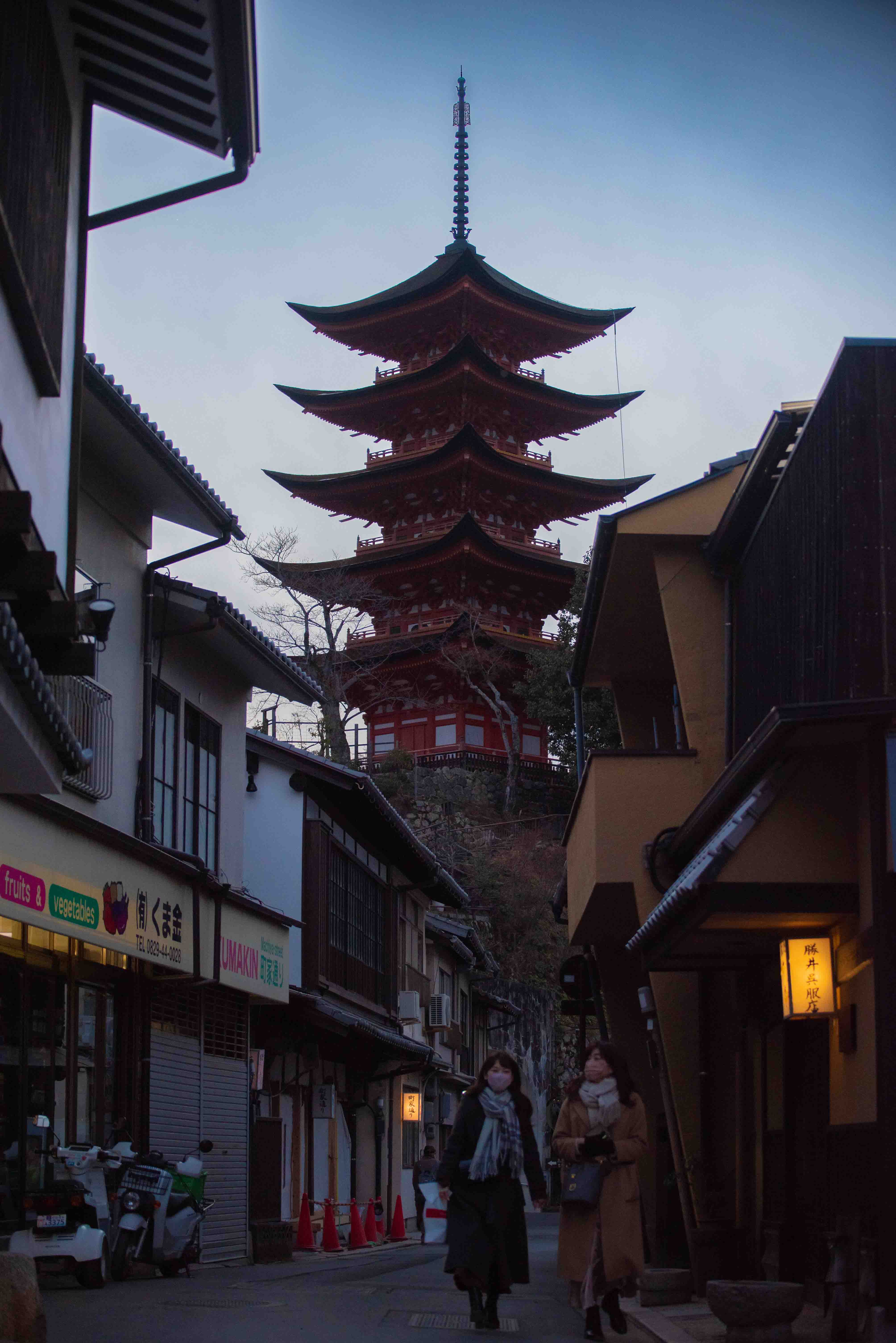Fushimi Inari shrine gates, bright-red, follow along path
